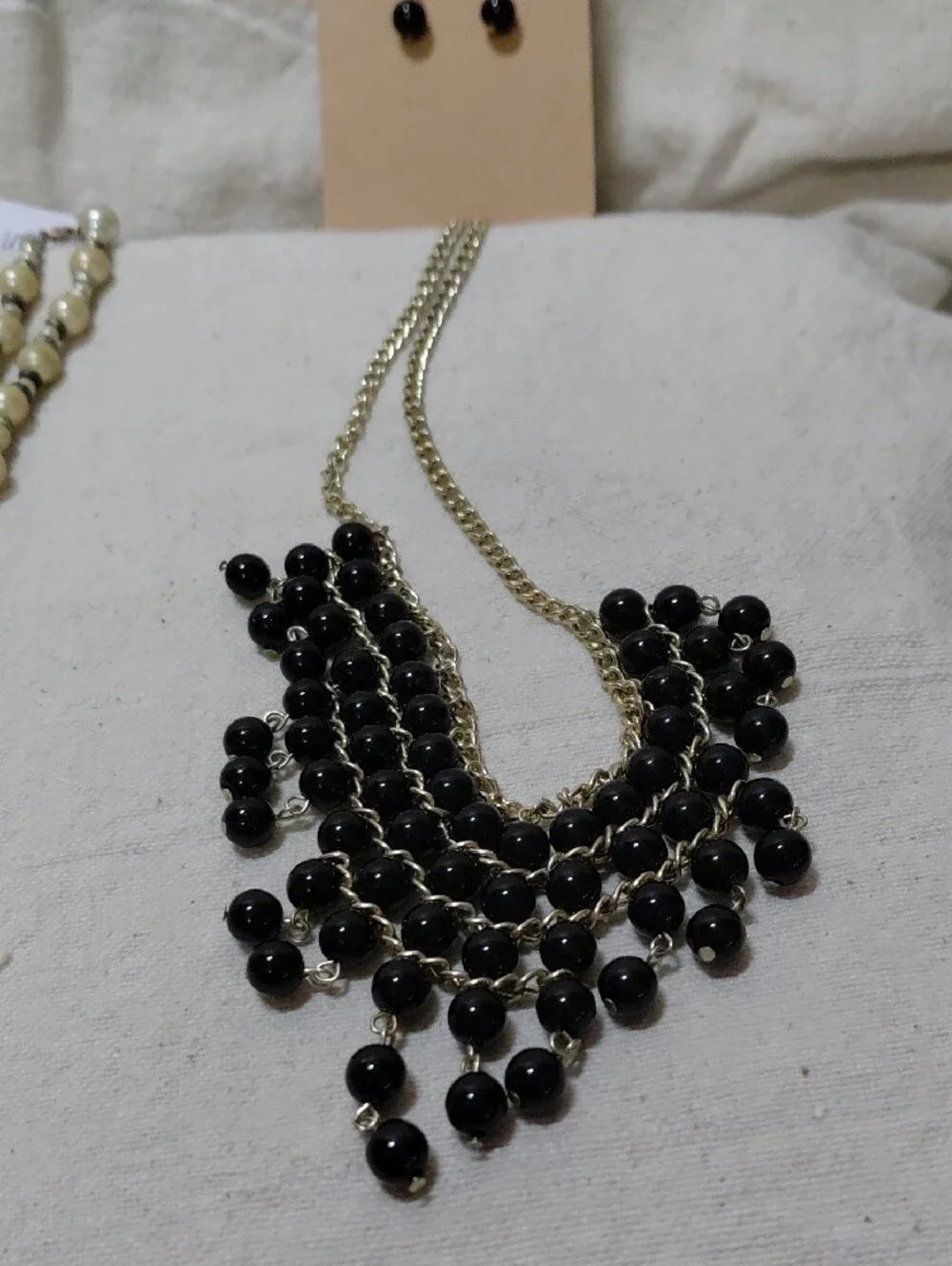 Set of Four Statement Necklaces and Earrings - Black, Pearl, Ivory